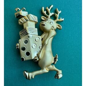 Vintage AJC Christmas Reindeer Carrying Gifts Matte Gold Tone Brooch Pin